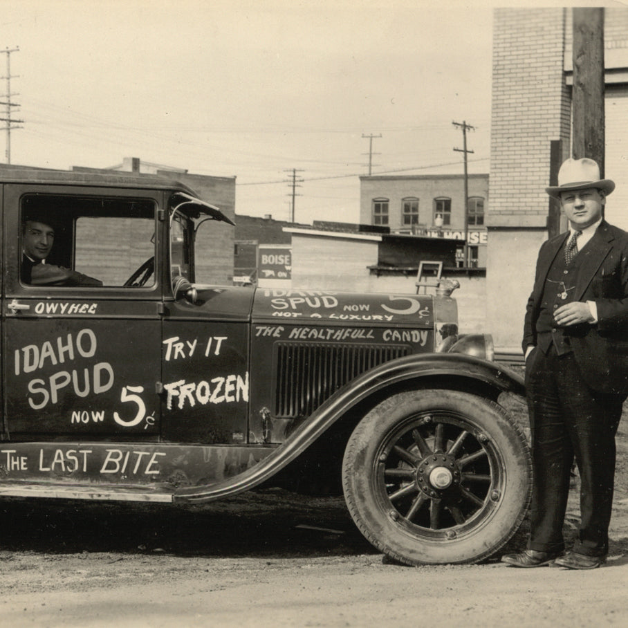 Idaho Candy Co.truck with man next to it